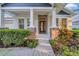 Beautiful entrance with a walkway and meticulously maintained landscaping at 15405 Woodstar Landing Ct, Lithia, FL 33547