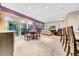 Bright and spacious living room with dining area and sliding glass doors to the lanai at 15405 Woodstar Landing Ct, Lithia, FL 33547