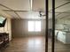 Spacious living room features wood-look flooring, perfect for relaxing and entertaining at 1710 7Th Sw St # 82, Ruskin, FL 33570