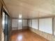 Bright sunroom featuring sleek flooring and many windows that offer natural light at 1710 7Th Sw St # 82, Ruskin, FL 33570