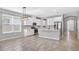 Bright kitchen featuring a central island and stainless steel appliances at 17651 Bright Wheat Dr, Lithia, FL 33547