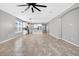 Open living space features tile floors, kitchen, and natural light at 17651 Bright Wheat Dr, Lithia, FL 33547