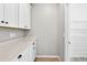 Walk-in pantry with plenty of shelving and cabinet storage space at 17651 Bright Wheat Dr, Lithia, FL 33547