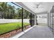 Spacious screened patio offers views of the backyard, connecting indoor/outdoor living at 17651 Bright Wheat Dr, Lithia, FL 33547