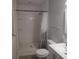 Updated bathroom featuring white subway tiles in the shower, modern vanity, and neutral color palette at 1922 Marvy Ave, Tampa, FL 33612