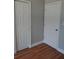 A bedroom with closet and access doors, complemented by clean white trim at 1922 Marvy Ave, Tampa, FL 33612