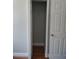 View into an open closet with a hanging rack and shelving at 1922 Marvy Ave, Tampa, FL 33612