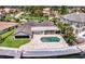 Beautiful backyard pool is surrounded by a travertine patio and overlooks the open bay at 2002 Carolina Ne Cir, St Petersburg, FL 33703