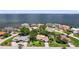 A beautiful neighborhood of luxury homes with manicured lawns and mature trees on a waterfront at 2002 Carolina Ne Cir, St Petersburg, FL 33703