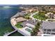 Breathtaking aerial view of a waterfront home with a private pool and neighborhood at 2002 Carolina Ne Cir, St Petersburg, FL 33703