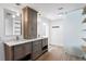 Spacious bathroom features double vanity, marble countertops, wood cabinetry, and elegant fixtures at 2002 Carolina Ne Cir, St Petersburg, FL 33703
