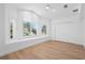 Bright bedroom with plantation shutters and large windows, providing ample natural light at 2002 Carolina Ne Cir, St Petersburg, FL 33703