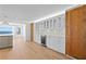 An open concept dining area features custom cabinetry, wine fridge, wooden accents, and water views at 2002 Carolina Ne Cir, St Petersburg, FL 33703