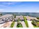 Stunning waterfront home with lush landscaping, circular driveway, and panoramic water views at 2002 Carolina Ne Cir, St Petersburg, FL 33703