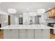 Spacious kitchen with large center island, stainless steel appliances, and custom cabinetry at 2002 Carolina Ne Cir, St Petersburg, FL 33703