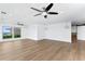 Spacious living room featuring water views and modern ceiling fans at 2002 Carolina Ne Cir, St Petersburg, FL 33703