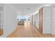 Bright, open-concept living area with wood floors and water views at 2002 Carolina Ne Cir, St Petersburg, FL 33703