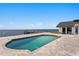 Backyard view of inground pool, patio, and water at 2002 Carolina Ne Cir, St Petersburg, FL 33703