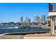 Panoramic waterfront view showcasing downtown skyline, boat dock, and serene waterside living at 2002 Carolina Ne Cir, St Petersburg, FL 33703