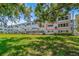 The meticulously maintained backyard and green space provide a serene view for residents at 2254 Norwegian Dr # 22, Clearwater, FL 33763