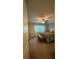 Comfortable bedroom featuring a ceiling fan, window with curtains, and neutral color scheme at 2411 Willimette Dr, Wesley Chapel, FL 33543