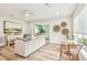 Inviting living room showcasing natural light, hardwood floors, and an open floor plan at 2452 Bayshore Blvd, Dunedin, FL 34698