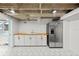 Bright basement kitchenette area complete with a stainless refrigerator and butcher block counter at 2819 N Central Ave, Tampa, FL 33602