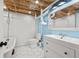 Updated basement bathroom with white subway tile, soaking tub and modern fixtures at 2819 N Central Ave, Tampa, FL 33602