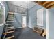 Bedroom features a loft space with light blue walls and gray carpet at 2819 N Central Ave, Tampa, FL 33602