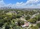 Aerial view of the city and charming neighborhood filled with mature trees on a sunny day at 2819 N Central Ave, Tampa, FL 33602