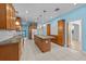 Spacious kitchen with tile floors, wood cabinets, and a large center island at 2819 N Central Ave, Tampa, FL 33602