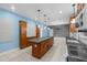 Large kitchen featuring an island, lots of cabinet space, and great lighting at 2819 N Central Ave, Tampa, FL 33602