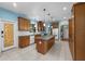 Bright kitchen with white appliances, wood cabinets and colorful stained-glass door at 2819 N Central Ave, Tampa, FL 33602