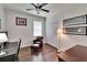 Bright office space with a ceiling fan, closet, and a comfortable leather chair at 2823 Holly Bluff Ct, Plant City, FL 33566