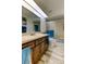 Well-lit bathroom featuring beach decor, a vanity, sink, and a bathtub at 318 Windrush Blvd # 10, Indian Rocks Beach, FL 33785