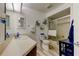 Bathroom featuring a vanity, sink, toilet and shower/tub combination at 318 Windrush Blvd # 10, Indian Rocks Beach, FL 33785