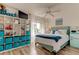Coastal-themed bedroom with a large white shelf featuring beach decor at 318 Windrush Blvd # 10, Indian Rocks Beach, FL 33785
