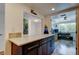 Renovated kitchen with sleek quartz countertops adjacent to a home office space at 318 Windrush Blvd # 10, Indian Rocks Beach, FL 33785