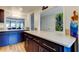 Beautiful kitchen features an island, quartz countertop, and stainless steel appliances at 318 Windrush Blvd # 10, Indian Rocks Beach, FL 33785