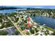 Desirable waterfront property featuring picturesque views, mature trees and lush landscaping from an aerial view at 321 42Nd S Ave, St Petersburg, FL 33705