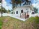 Backyard features a patio and grassy area, providing outdoor space at 321 42Nd S Ave, St Petersburg, FL 33705
