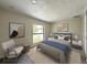 Cozy bedroom features a large window and neutral decor at 321 42Nd S Ave, St Petersburg, FL 33705