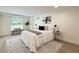 Modern bedroom features neutral tones, a large window, and stylish decor at 321 42Nd S Ave, St Petersburg, FL 33705