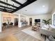 Bright, open living area with modern decor, wood floors, and a sleek, beamed ceiling at 321 42Nd S Ave, St Petersburg, FL 33705