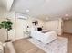 Cozy bedroom with an air conditioner, soft lighting, and neutral decor with vinyl floors at 321 42Nd S Ave, St Petersburg, FL 33705