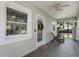 Inviting front porch with comfortable seating and a welcome mat at 3220 W San Pedro St, Tampa, FL 33629