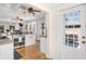 Bright kitchen featuring stainless steel appliances, granite countertops, and hardwood floors at 3220 W San Pedro St, Tampa, FL 33629