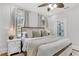 Cozy main bedroom featuring an ensuite bathroom and natural light at 3220 W San Pedro St, Tampa, FL 33629