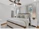 Well-lit main bedroom with neutral tones, plush bedding, and ample natural light at 3220 W San Pedro St, Tampa, FL 33629