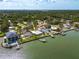 Waterfront home features a private dock, landscaping and beautiful waterfront access at 3290 Sunset N Dr, St Petersburg, FL 33710